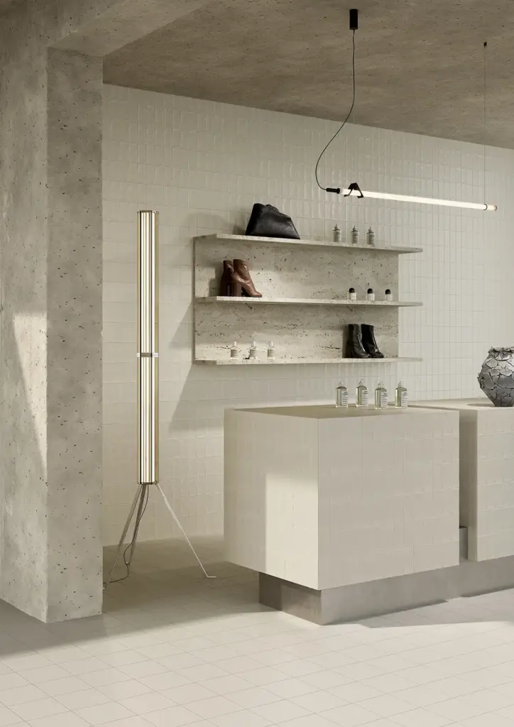 Berlese tiles: a shop with Cream walls and tiled display plinths
