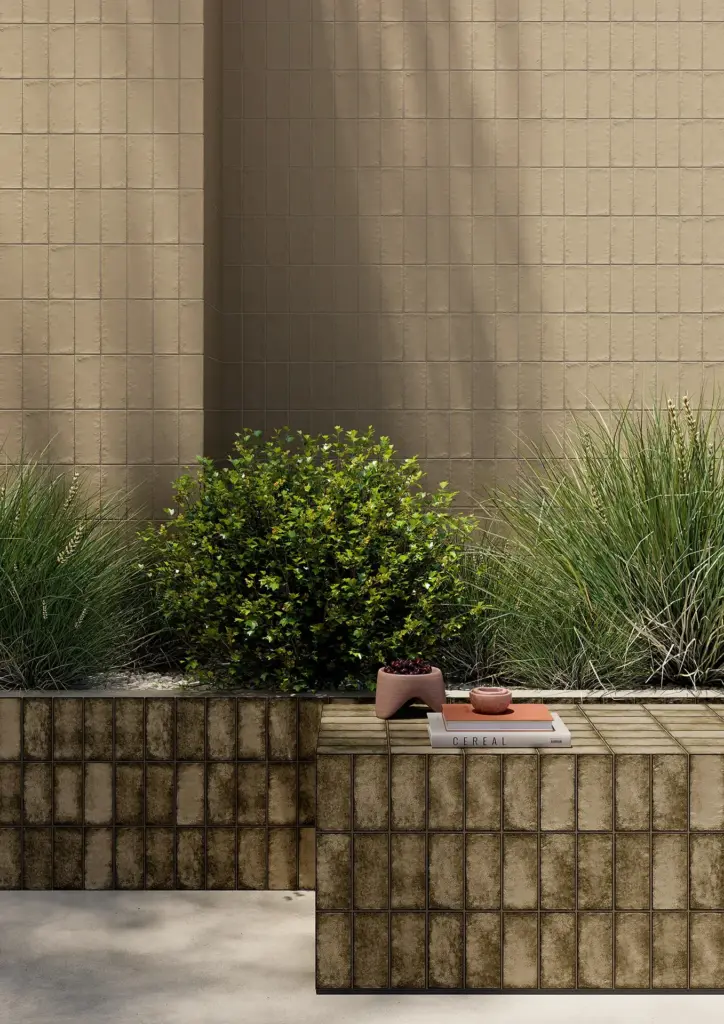 Berlese tiles: Arida clad planters in front of a tiled wall