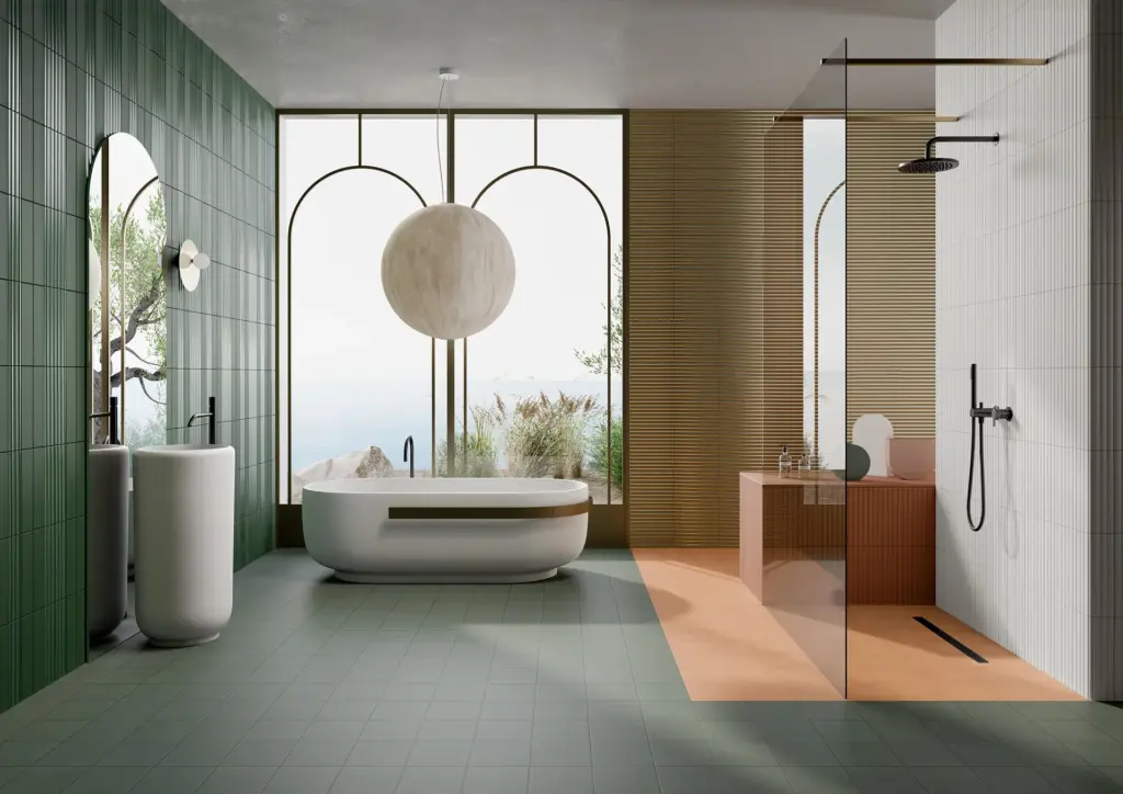 Pieralunga tiles: a bathroom with Emerald walls and a Gold panel behind the bath