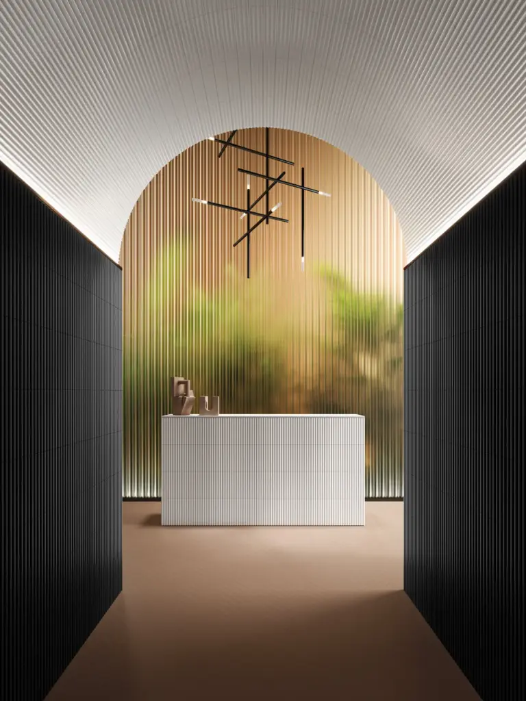 Pieralunga tiles: a reception with Black walls and a White desk